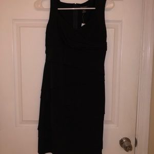 Simple black dress with subtle V-neck cut